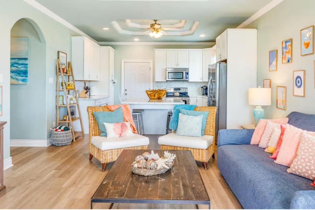 a living room with a couch and chairs and a table at 4BR Near the BeachFire PitFamily Friendly Stay in Bolivar Peninsula