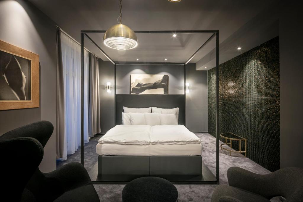 Postel nebo postele na pokoji v ubytování Pytloun Grand Hotel Imperial