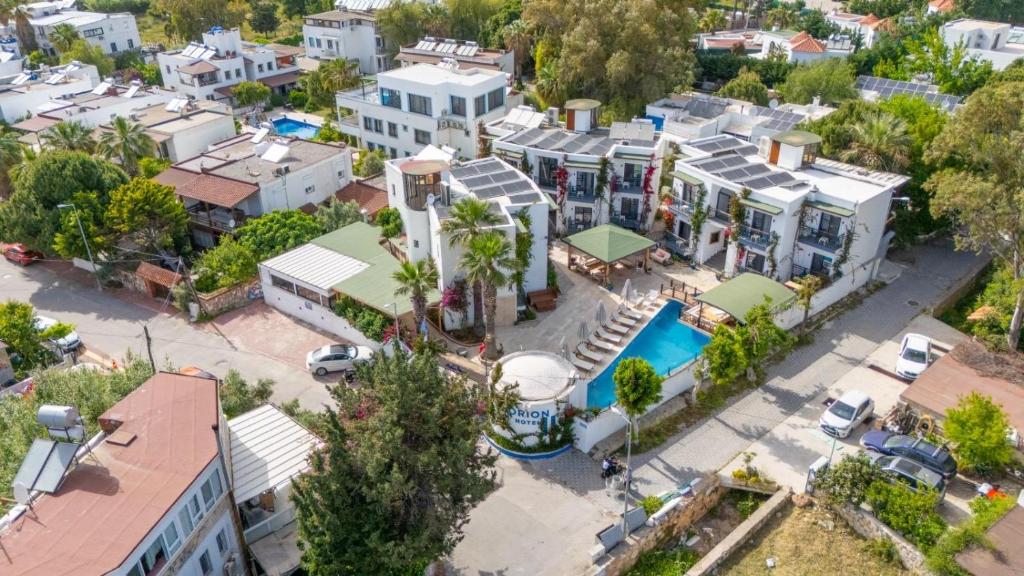 an aerial view of a building with a pool at Orion hotel in Bodrum City