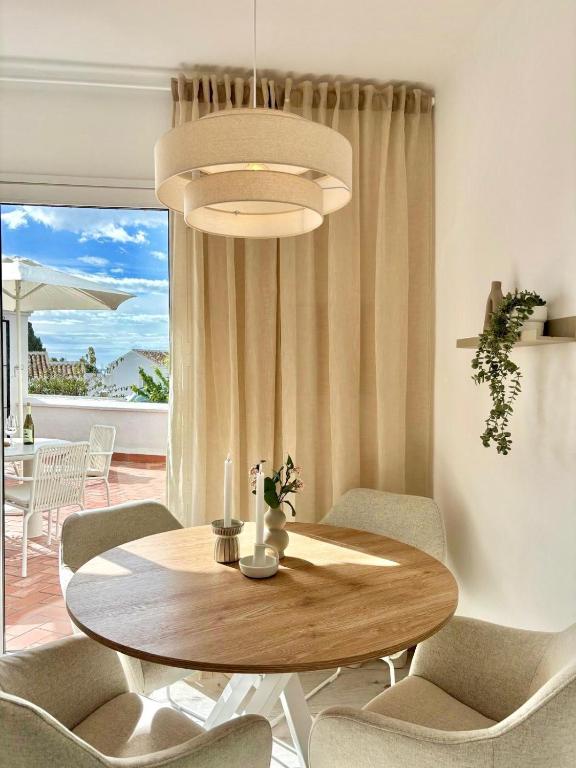 Sunny Flat with Pools & Terrace in Oasis of Nerja