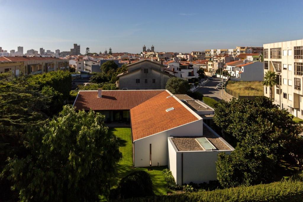 an aerial view of a city with buildings at Guest H4U Povoa Vacation City center in Póvoa de Varzim