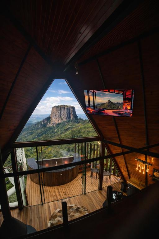an overhead view of a room with a view of a mountain at Chalé Boutique- Spa Campos do Jordão in Campos do Jordão