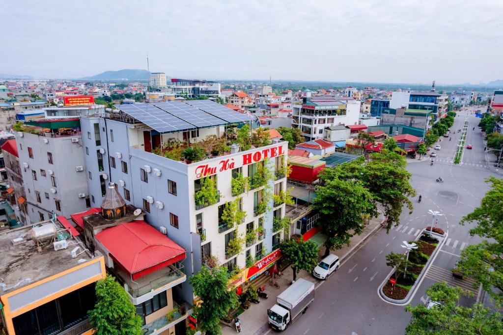 an overhead view of a city street with buildings at Thu Ha Hotel in Uông Bí