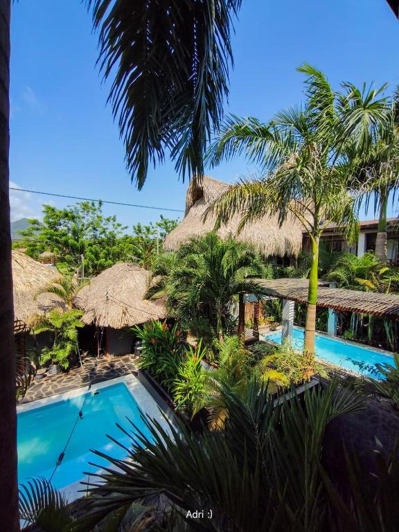 a view of a resort with a swimming pool at Villa Eden Palomino in Palomino