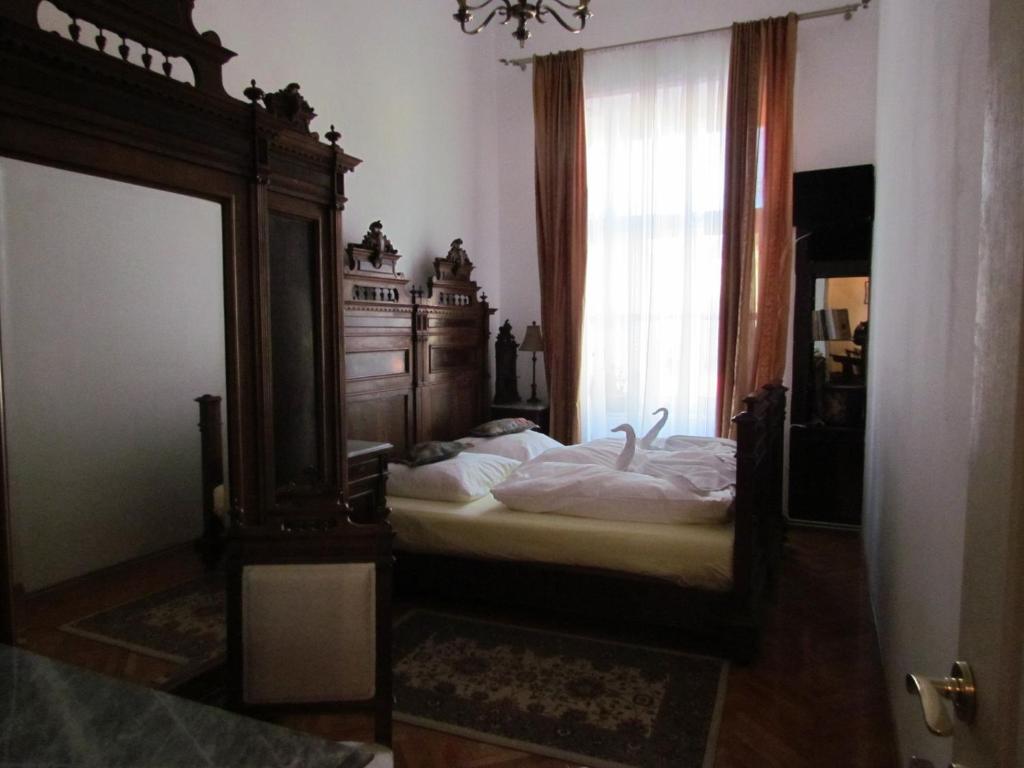 Postel nebo postele na pokoji v ubytování Casa Generalului