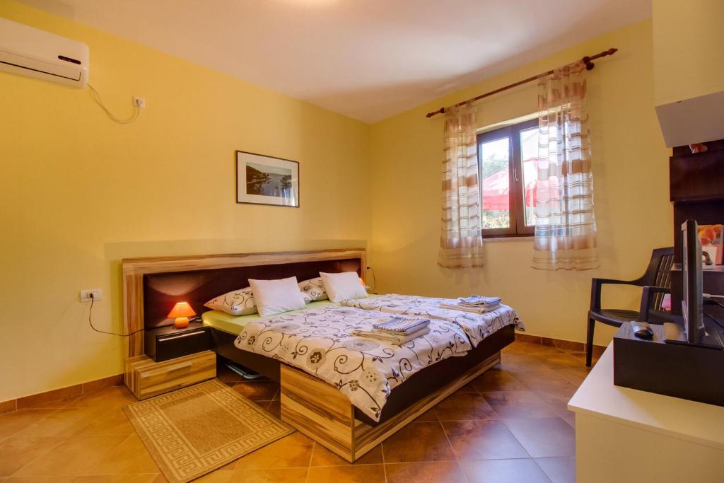 Postel nebo postele na pokoji v ubytování Abba Apartments