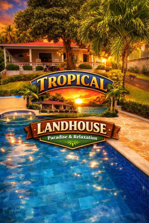 a sign in front of a pool at a resort at Tropical Landhouse in Sánchez