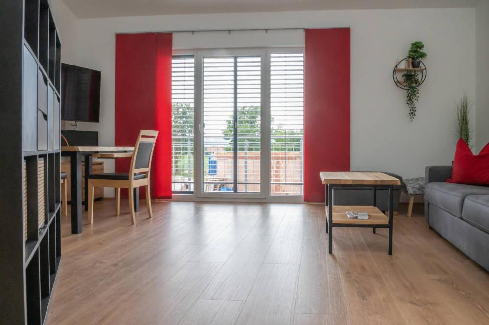 a living room with a couch and a table at Ferienwohnung Döller in Gmünd