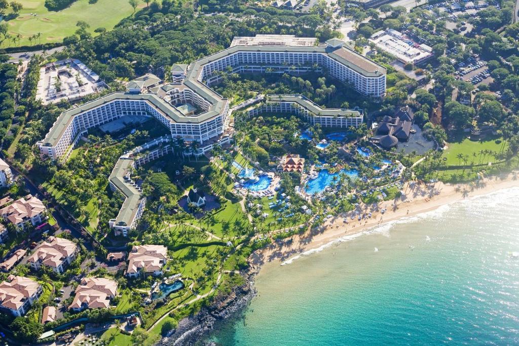an aerial view of a resort next to the beach at Grand Wailea Resort Hotel & Spa, A Waldorf Astoria Resort in Wailea