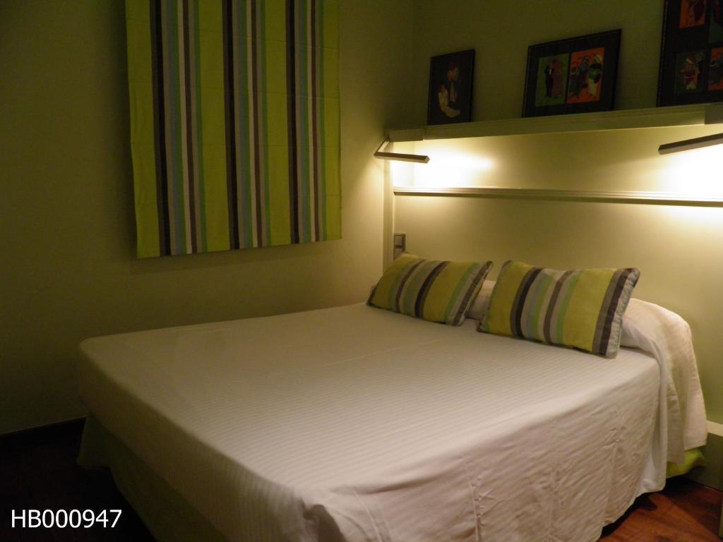 Postel nebo postele na pokoji v ubytování Hotel Annex - Rey Don Jaime I