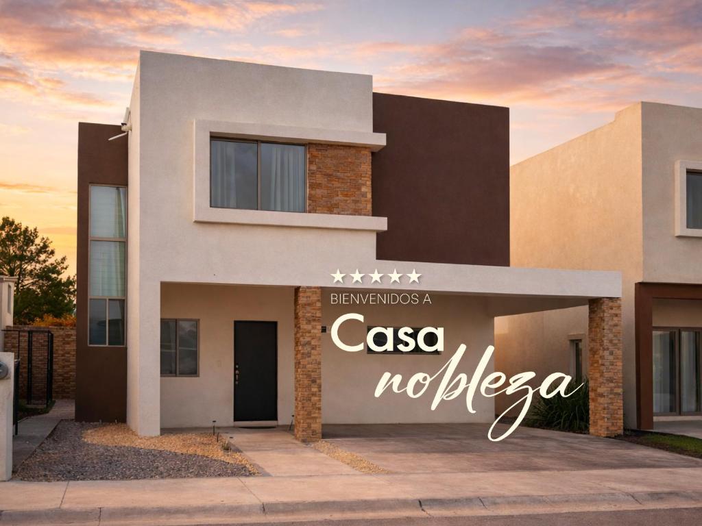 a building with a sign that reads casa noticia at Casa Nobleza in Manuel F. Martínez
