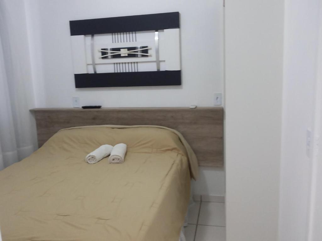 Postel nebo postele na pokoji v ubytování Residencial Neto