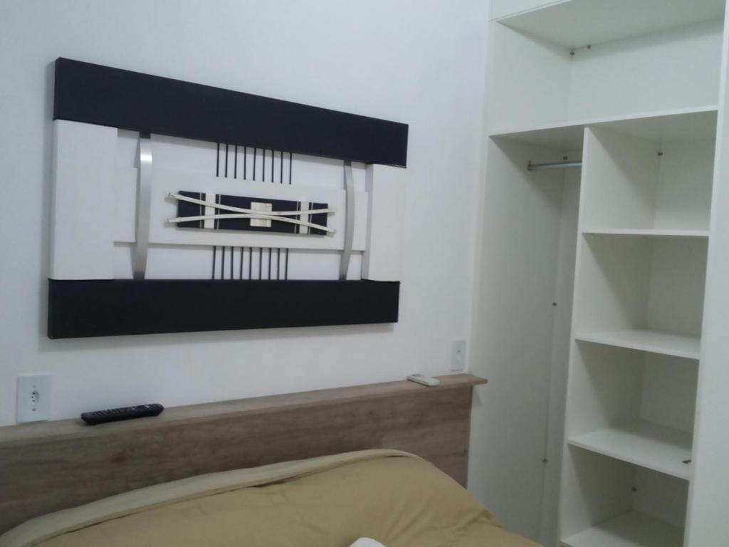 Postel nebo postele na pokoji v ubytování Residencial Neto