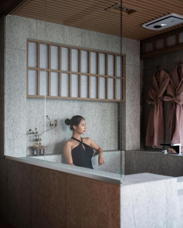 a rendering of a woman in a bath tub at Goyuhanga in Busan