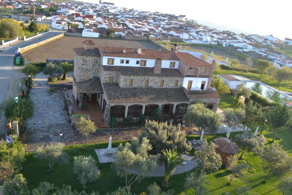 an aerial view of a large house with a yard at Rincón del Abade in Encinasola