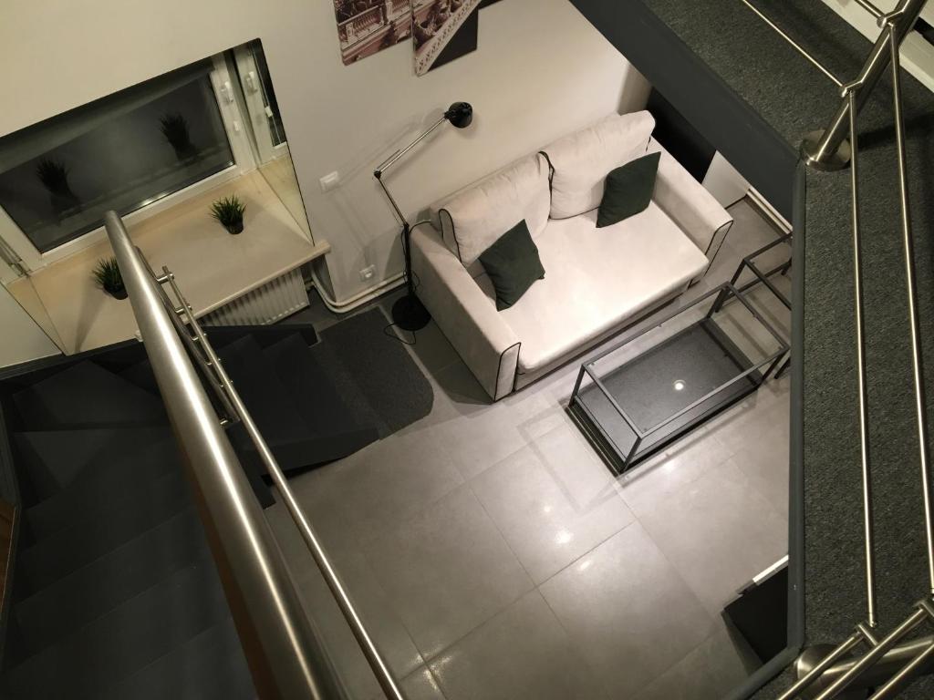 an overhead view of a living room with a couch at Apartments 4 You in Wrocław