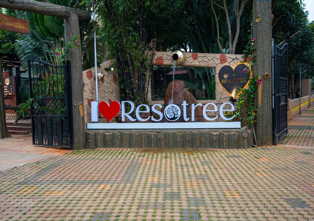 a gate with a sign that says rescue at Resotree in Talai