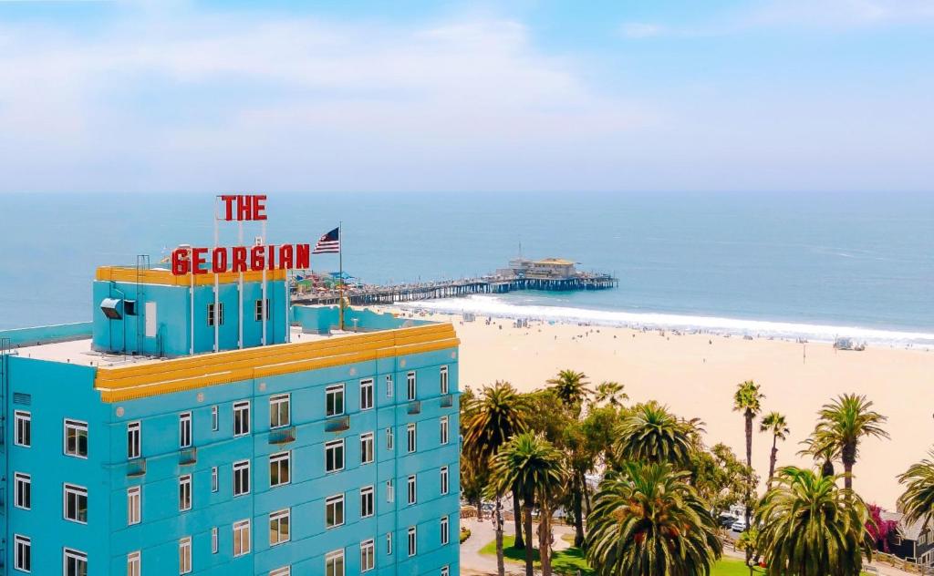 a building on the beach with a sign on it at The Georgian, in The Unbound Collection by Hyatt in Santa Monica