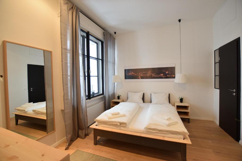 Posteľ alebo postele v izbe v ubytovaní Luxury Apartment by Hi5 - Bajcsy Suite