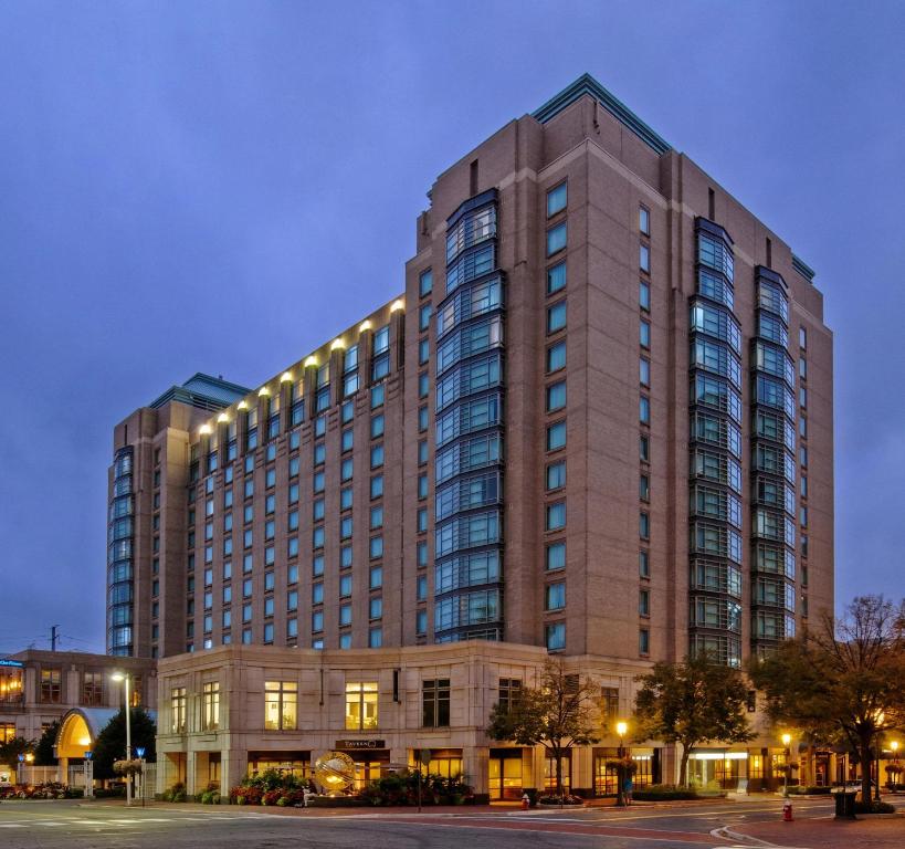 a large building with lights on top of it at Hyatt Regency Reston in Reston