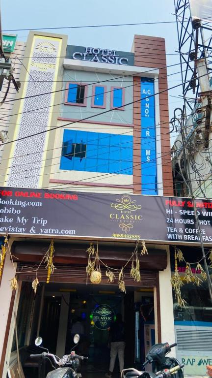 a store front of a building with a sign at HOTEL classic in Visakhapatnam