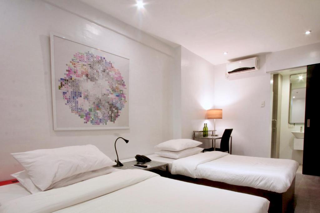 Postel nebo postele na pokoji v ubytování Hotel Durban