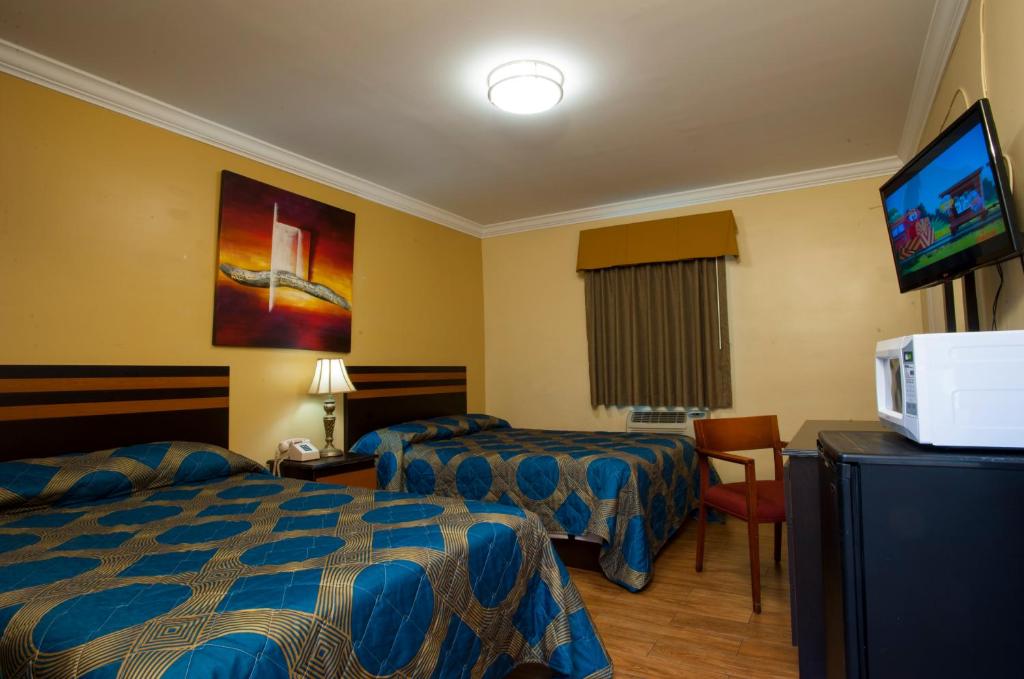 TV a/nebo společenská místnost v ubytování King Motel - Miami