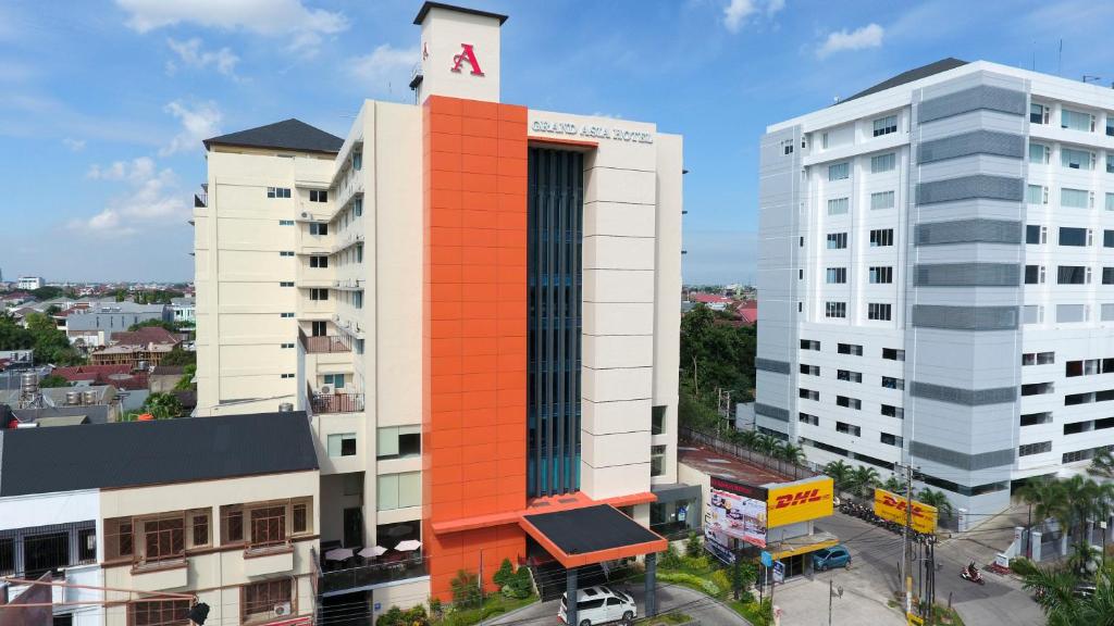 an overhead view of a building in a city at Grand Asia Hotel in Makassar