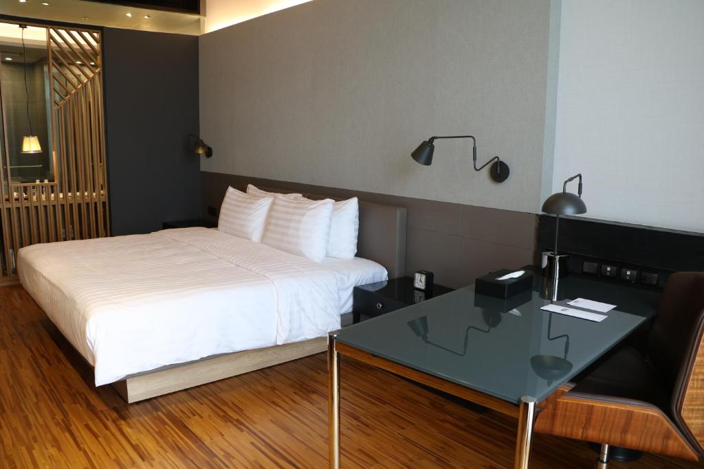 Postel nebo postele na pokoji v ubytování Midori Clark Hotel and Casino