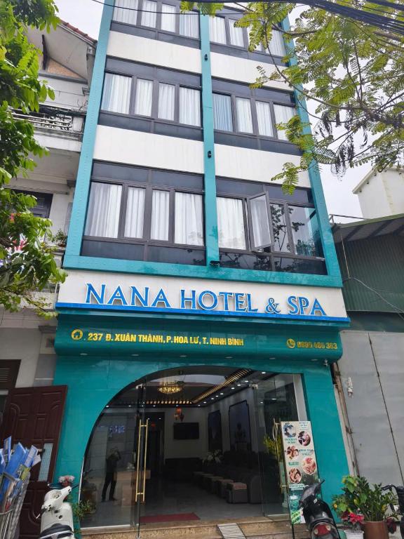 a building with a sign for a nana hotel and spa at Khách Sạn Phố Cổ Ninh Bình NANA HOTEL in Kỳ Vĩ