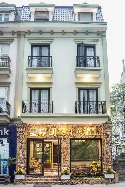a hotel front with a sign in front of it at Blubiz Hotel 9 in Hanoi