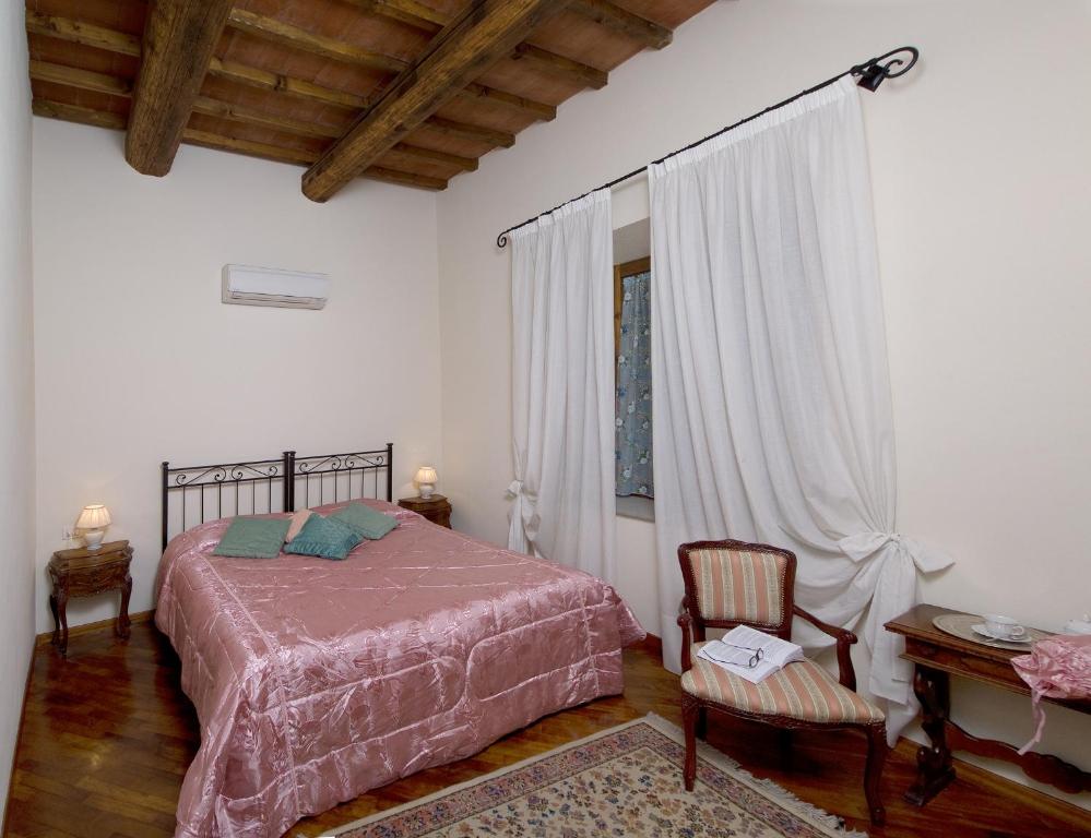 Łóżko lub łóżka w pokoju w obiekcie Accademia Residence