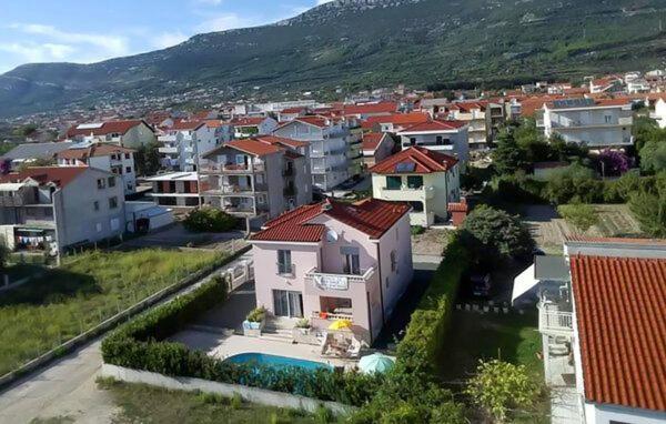 an aerial view of a small town with a house at Vila Giulietta in Kaštela
