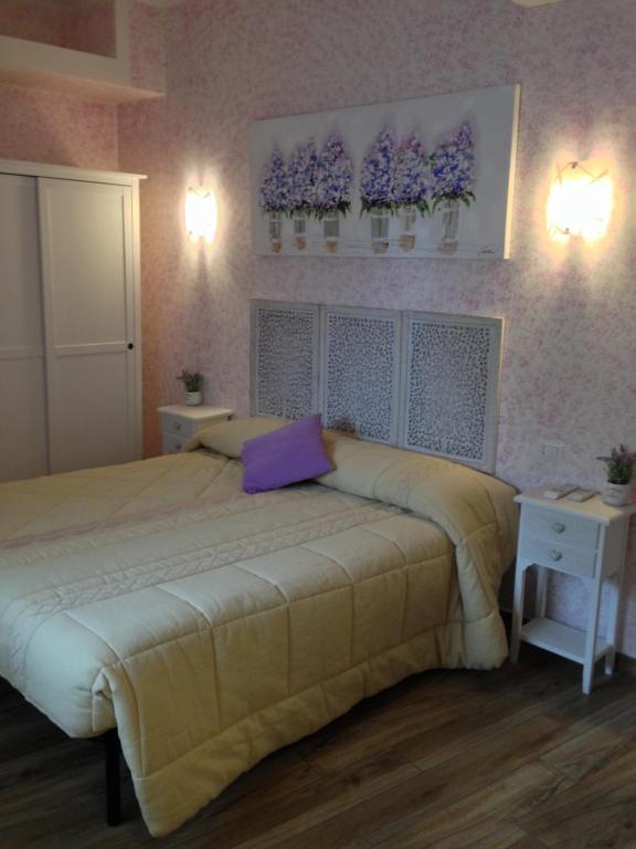 Ένα ή περισσότερα κρεβάτια σε δωμάτιο στο Flores B&B