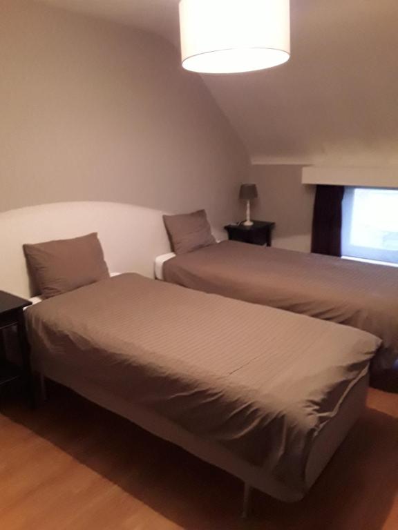 Postel nebo postele na pokoji v ubytování Wenceslas Cobergher III