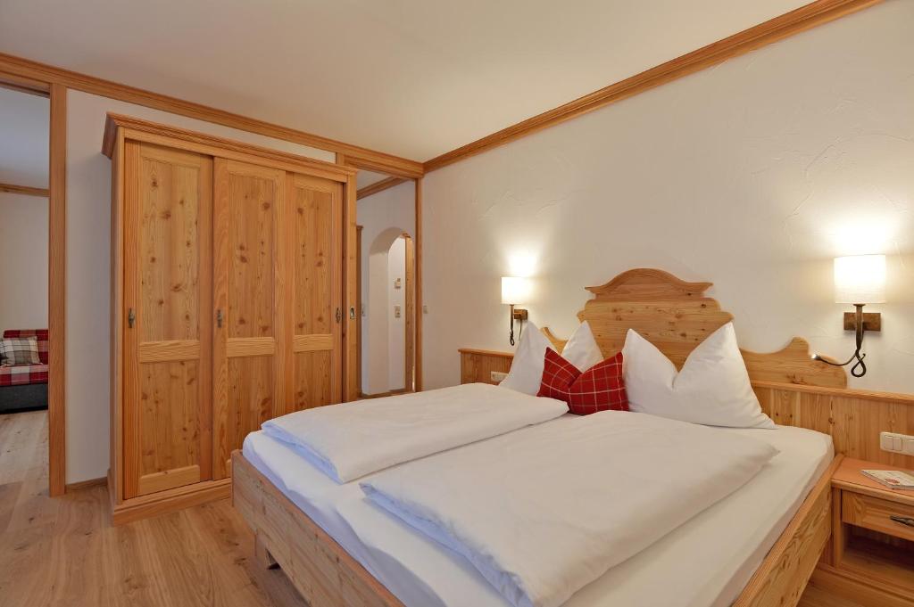 Postelja oz. postelje v sobi nastanitve Hotel Ritterhof Ellmau
