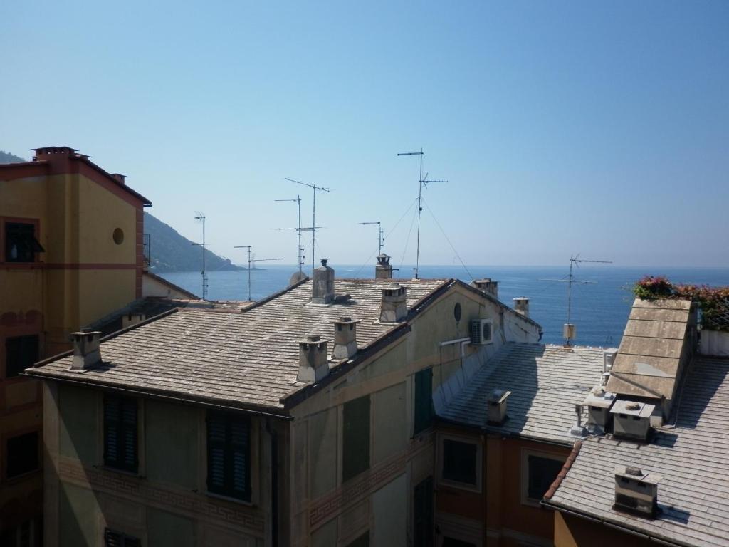 a view of roofs of buildings in a city at Infinity Mare/Monti in Camogli