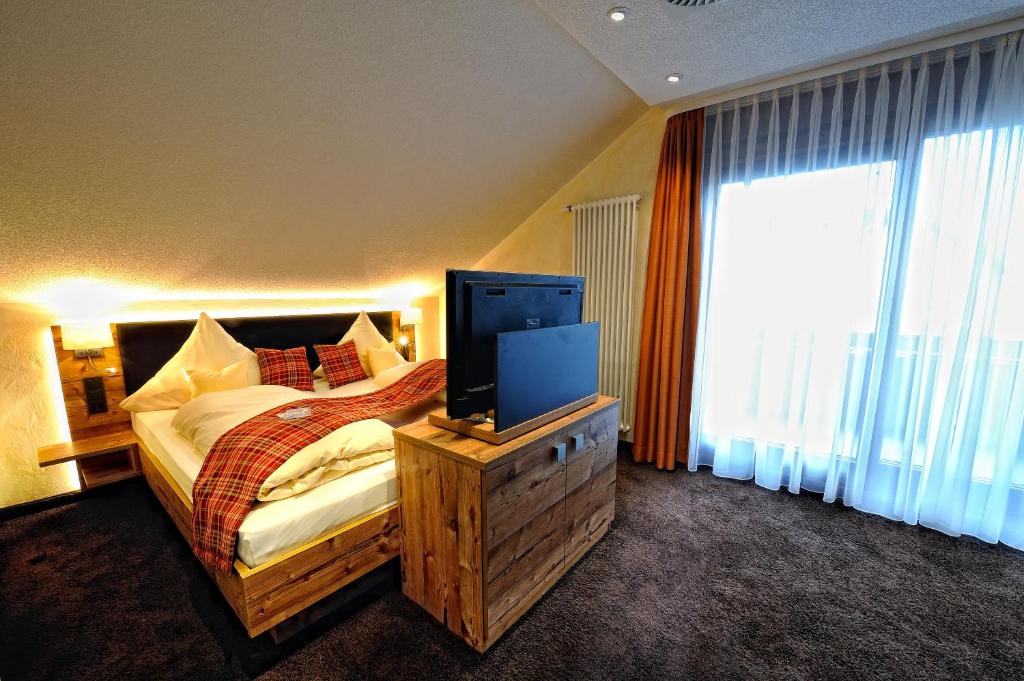 Postel nebo postele na pokoji v ubytování Wellness-Hotel Talblick