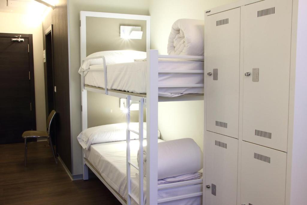 Postel nebo postele na pokoji v ubytování Poshtel Bilbao - Premium Hostel