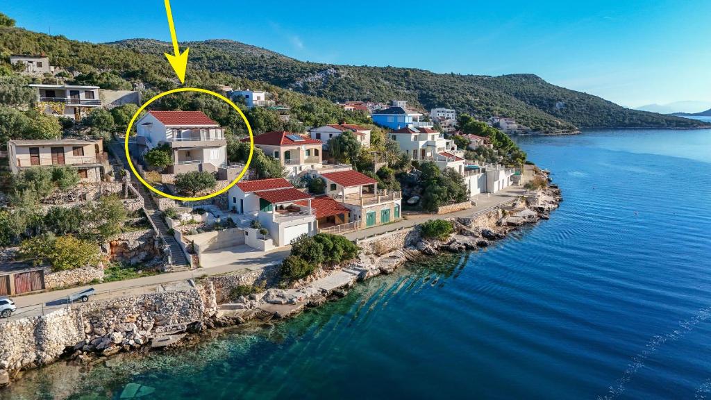 an aerial view of a town on the water at Apartments Rusulica in Vinišće