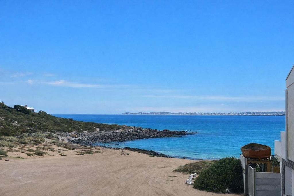 a view of the ocean from a house at Fluisterbaai in Britannia Bay