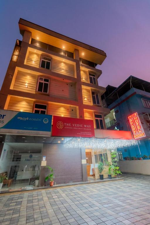 a building with a sign in front of it at Grace Apart Hotel @Kochi in Cochin