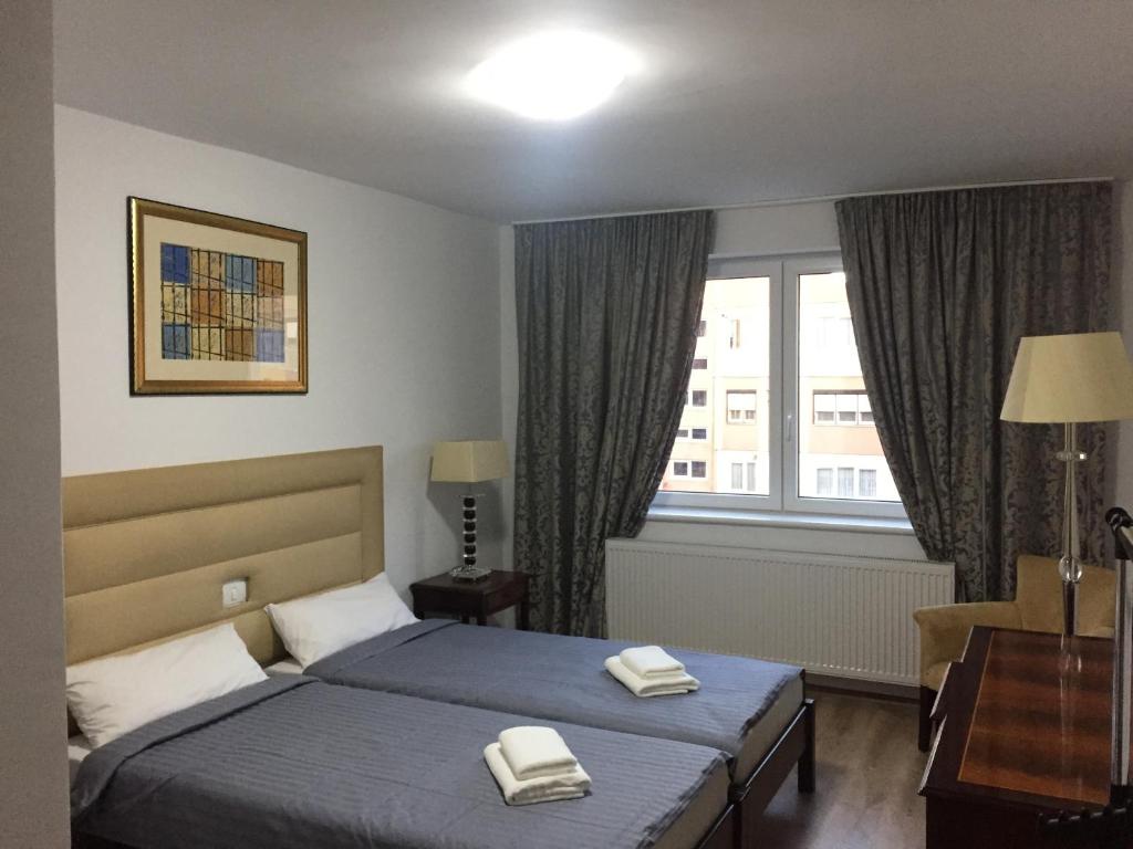 Postel nebo postele na pokoji v ubytování Hotel EKA