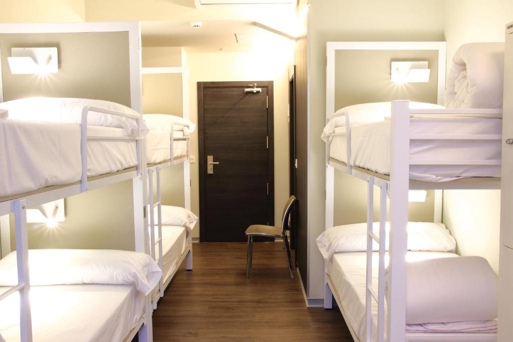 Postel nebo postele na pokoji v ubytování Poshtel Bilbao - Premium Hostel