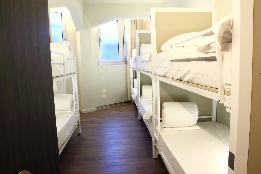 Postel nebo postele na pokoji v ubytování Poshtel Bilbao - Premium Hostel