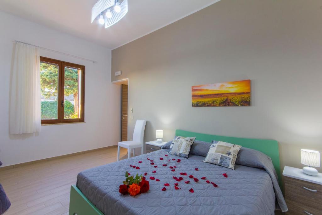 
A bed or beds in a room at Vigne al Vento
