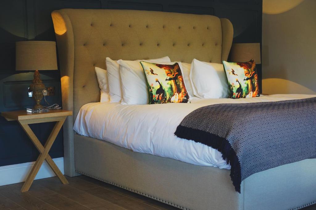 A bed or beds in a room at The Mill at Conder Green 