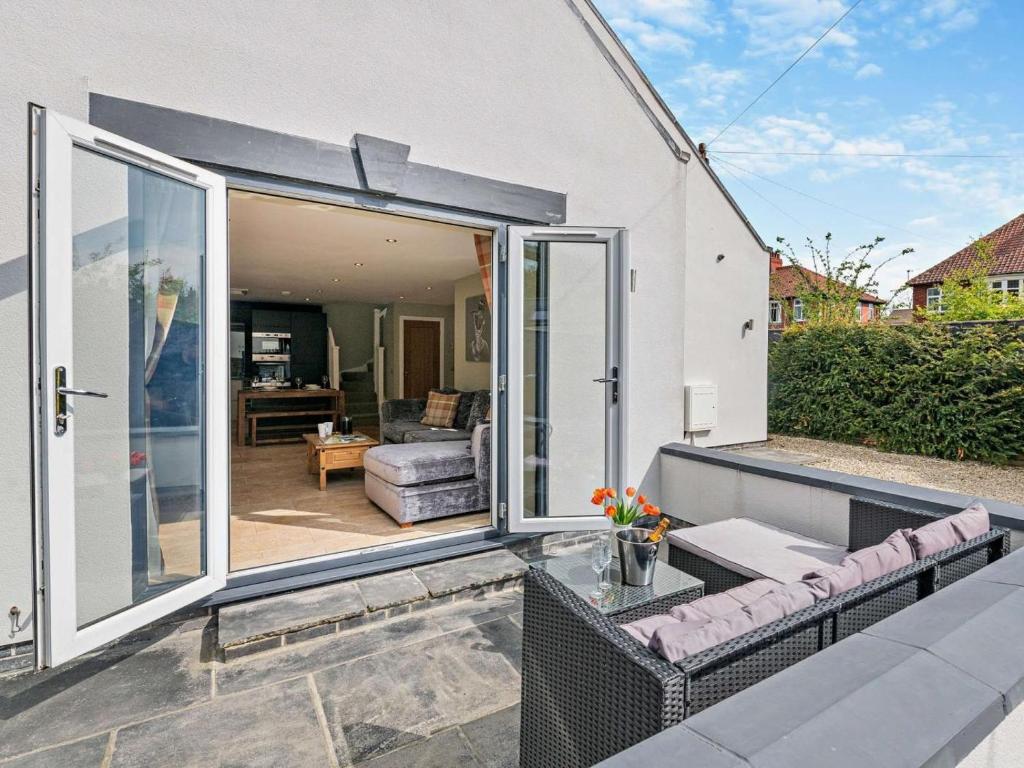 a patio with a couch and a table at 2 Bed in Middlesbrough oc-75226 in Great Ayton