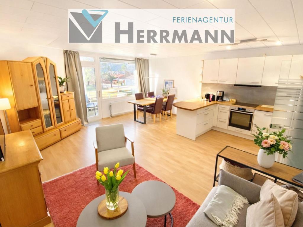 a living room with a kitchen and a living room at Ferienwohnung Bergblick in Füssen
