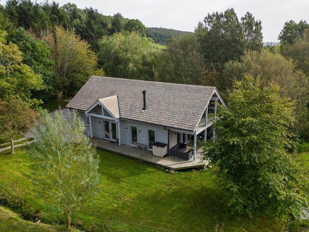 an aerial view of a house in a field at 3 Bed in Otley oc-g0176 in Timble